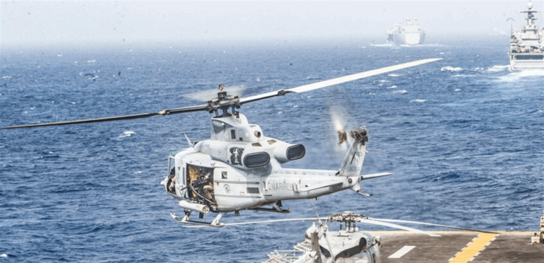 التهديد بمرافقة سفن النفط في مضيق هرمز وضمانات أميركية للملاحة